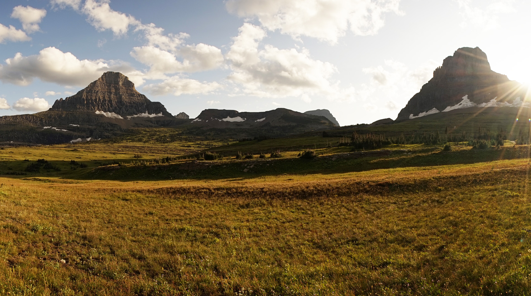 Sunset over mountains near logan pass